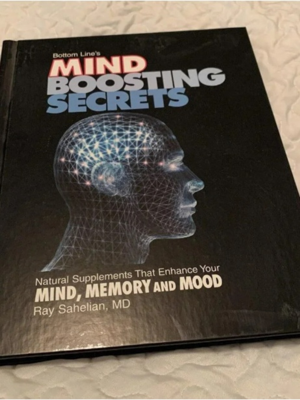 Mind Boosting Secrets Hardcover - Black with Blue and Red Text